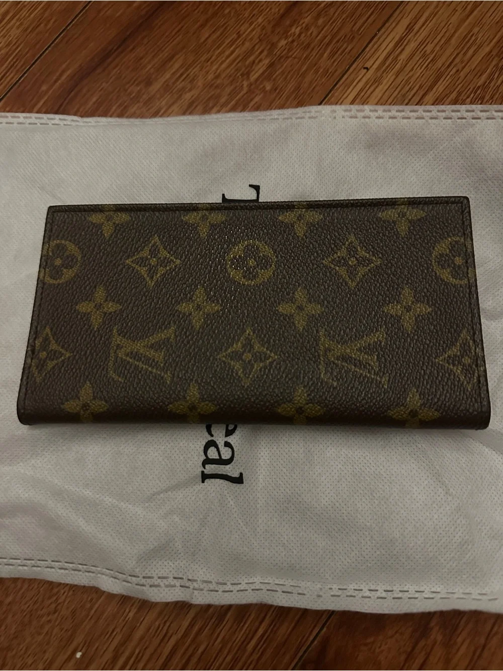 Saks Fifth Avenue limited edition Louis Vuitton Monogram Long Check Book